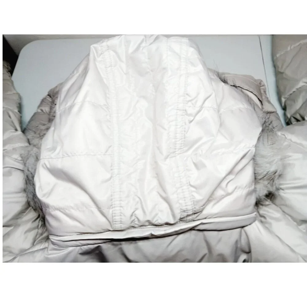 Long winter puffer coat with duffle button design with a zip closure - Picture 11 of 15